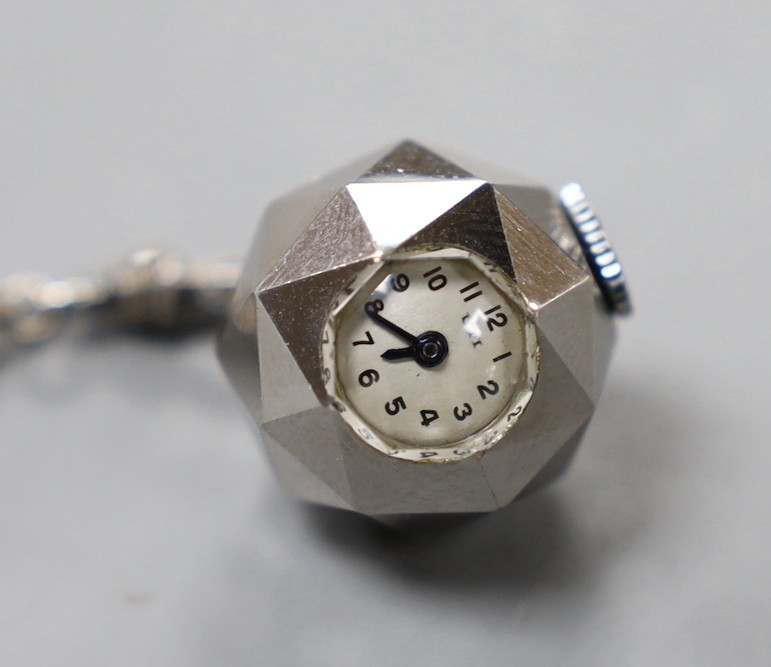 A 1920's mesh white metal and rose cut diamond chip set suspension brooch, with arrow head and quiver terminals, now hung with a later steel? Uti fob watch.